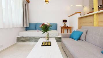 Family Quadruple Room | Living area