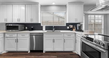 🏝️ Spacious Coastal Getaway | Sleeps 16 | SouthSide <br><br>This 4BR, 2BA home is perfect for large families & groups, just a quick drive to Whitecap Beach, dining & shopping. Enjoy TWO massive living rooms, a fully stocked kitchen, & spacious dinin