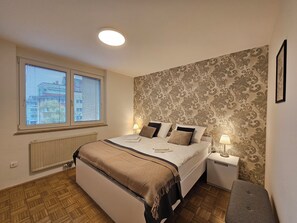 3 bedrooms, desk, iron/ironing board, travel cot