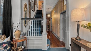 Interior - 1 bedroom, 1 bathroom suite in Downtown Augusta. The sleeping arrangements for this unit are a full bed and a pull-out couch in the living room. (Augusta)