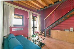 Family Room, Multiple Bedrooms (Junior Suite Borgogna - Almavite) | Living area | 21-inch Smart TV with cable channels - Almavite Wine Resort (Desenzano del Garda)