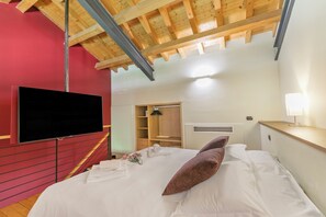 Familieværelse - flere soveværelser (Junior Suite Coppa - Almavite) | 1 soveværelse, gratis Wi-Fi, sengetøj