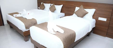 Premium bedding, desk, laptop workspace, soundproofing