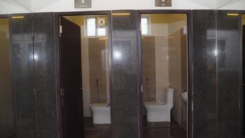 Shower, rainfall showerhead, bidet, towels