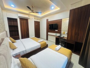 Family Room | Premium bedding, Select Comfort beds, desk, laptop workspace - Hotel Deep Palace (Varanasi)