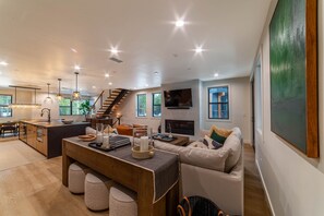 Smart TV, fireplace, foosball, books