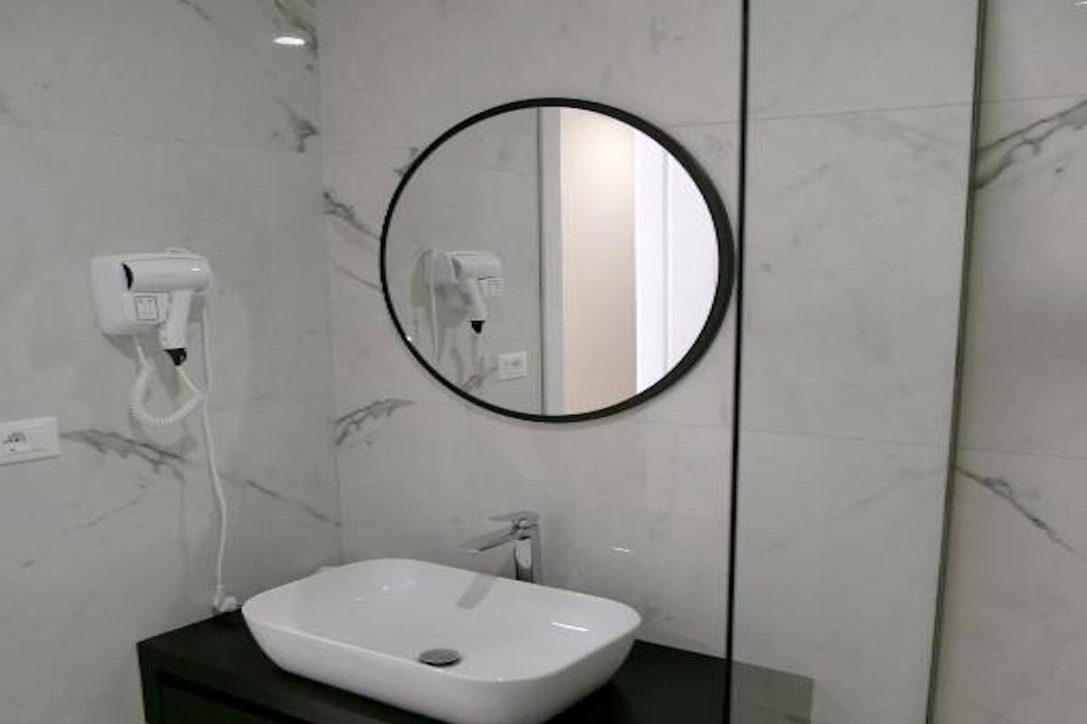 Baño | Albornoces y zapatillas
