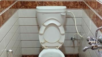 Standard Double Room | Bathroom | Shower, towels, soap, shampoo