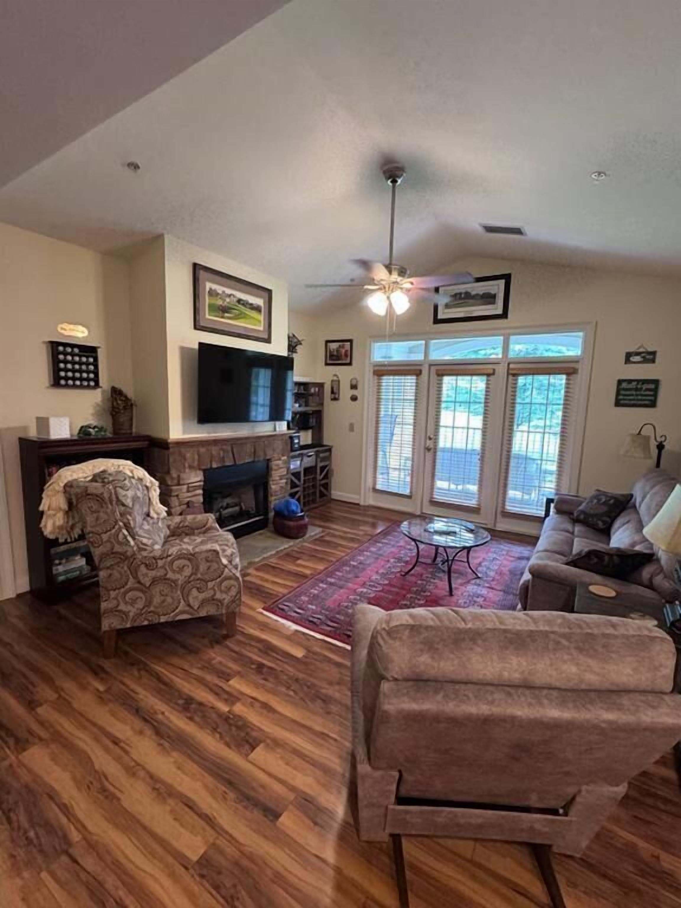 Smart TV, fireplace, books, printers