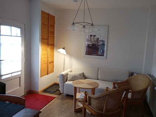 Vacation apartment near the national park and harbor with terrace and parking space