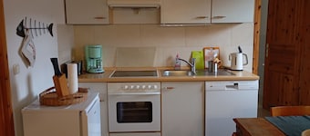 Vacation apartment near the national park and harbor with terrace and parking space
