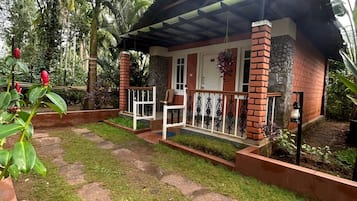 Family Cottage, Patio, Garden View | Individually furnished, desk, laptop workspace, free WiFi