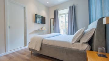 In-room safe, desk, laptop workspace, blackout curtains