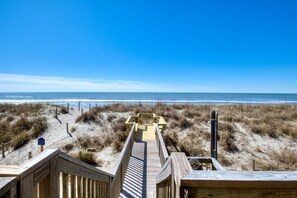 Walk along the beachside boardwalk to the ocean's edge.