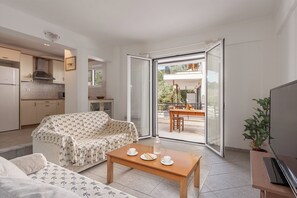 Apartment, 2 Bedrooms, Partial Sea View | Living area | Flat-screen TV - Ionian Memories (Lefkada)