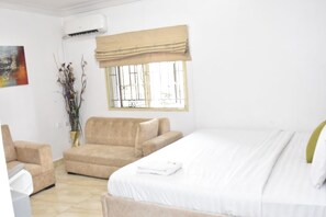 In-room safe, desk, laptop workspace, blackout curtains