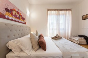 2 dormitorios, tabla de planchar con plancha, wifi gratis y ropa de cama