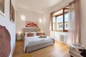 2 dormitorios, tabla de planchar con plancha, wifi gratis y ropa de cama