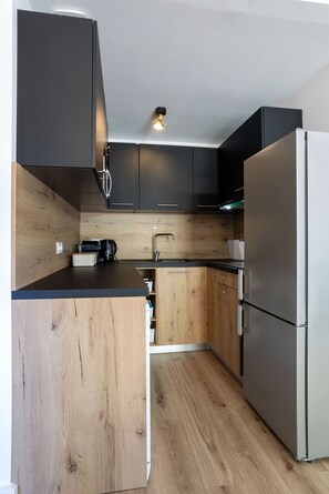 Réfrigérateur, micro-ondes, four, lave-vaisselle