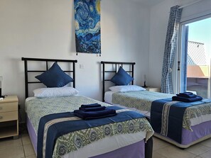 2 bedrooms, in-room safe, iron/ironing board, travel cot