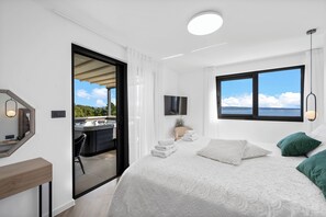 4 عدّة غرف نوم ومكواة/لوح كي وواي فاي مجانًا وملاءات أسرّة