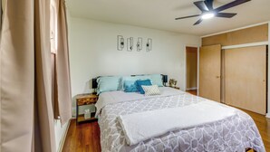A bedroom with a bed, bedside tables, a ceiling fan, and a wardrobe. - 3 Mi to Berkshire Mall: Suburban Stay w/ Yard! (Sinking Spring)