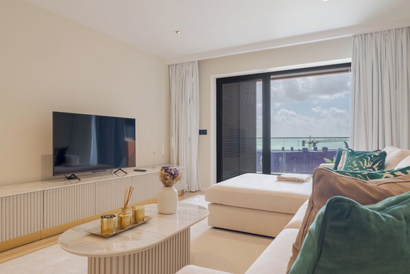 Deluxe Apartment, Balcony, Ocean View | Living area | 45-inch TV with cable channels - Serenity Madeira (Funchal)