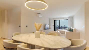 Deluxe Apartment, Balcony, Ocean View | Living area | 45-inch TV with cable channels