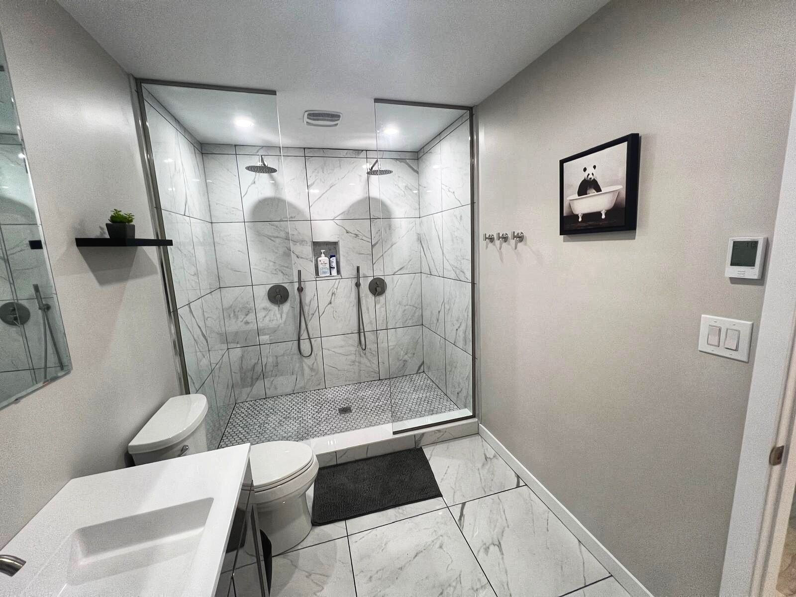 Shower, hair dryer, soap, shampoo