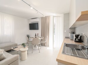 Apartment (Modern City Escape) | Living room | 32-inch flat-screen TV with cable channels - Modern City Escape (Dubrovnik)
