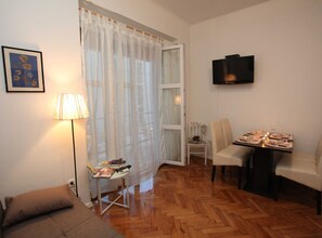 Apartment (Comfort One Bedroom Apartment with Ba) | Living room | 32-inch flat-screen TV with cable channels - Old Town Zadar Cozy and Comfy Apartments (Zadar)