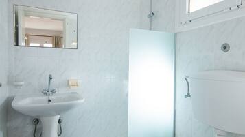 Shower, eco-friendly toiletries, hair dryer, towels