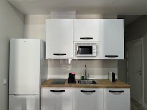 Fridge, microwave, coffee/tea maker, electric kettle