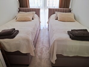 2 bedrooms, iron/ironing board, WiFi, bed sheets