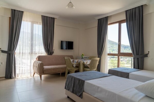 Family Studio, Balcony, Mountain View | Soundproofing, free WiFi
