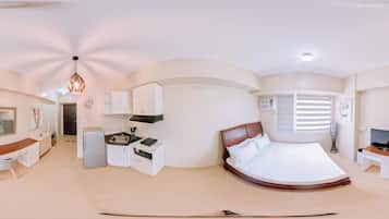 Condo, 1 quarto, varanda, vista para o jardim | Sala de estar