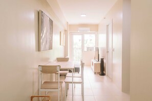 Condo, 1 Bedroom, Balcony | Dining room - Pool & Garden Tranquility (Iloilo)