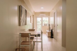 Condo, 1 Bedroom, Balcony | Dining - Pool & Garden Tranquility (Iloilo)