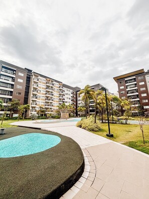 Condo, 2 Bedrooms, Balcony | Property grounds - Elegant 2 Bedrooms With Pool View (Iloilo)