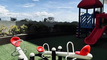 Condo, 1 quarto, sacada, vista para o jardim | Área infantil