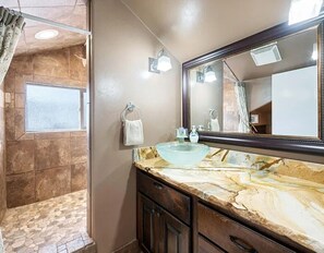 Shower, eco-friendly toiletries, hair dryer, towels