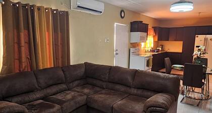 Conveniently located 2-bedroom apartment in Saint Helena with WiFi, AC & laundry