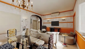 Departamento Deluxe, 3 habitaciones | Área de sala de estar