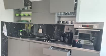ALMA family apartment with roof terrace in a quiet location
