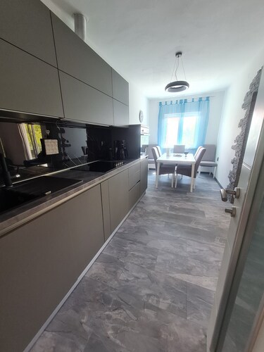 ALMA family apartment with roof terrace in a quiet location