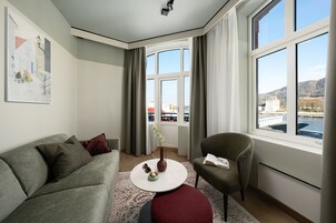 Apartment, 1 Bedroom | Living area | 50-inch Smart TV with digital channels