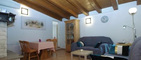 Appartement, 1 chambre, patio, vue sur le jardin | Salle de séjour