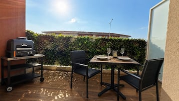 SuĂte luxo, varanda, vista para o jardim | Terraço/pĂĄtio