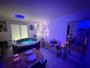 Deluxe-suite - terrasse - udsigt til have | Opholdsområde