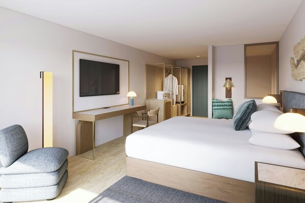 1 kamar tidur, minibar, brankas, dan meja kerja
